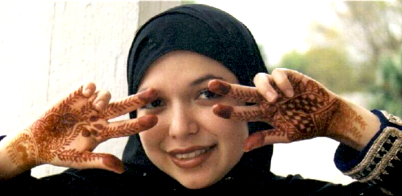 A proud Latina Muslim displaying her henna.