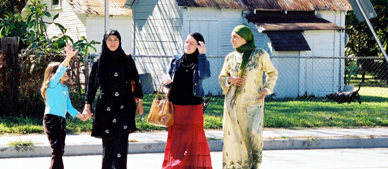 Latina Muslim women walking to a local mosque for Eid celebrations.